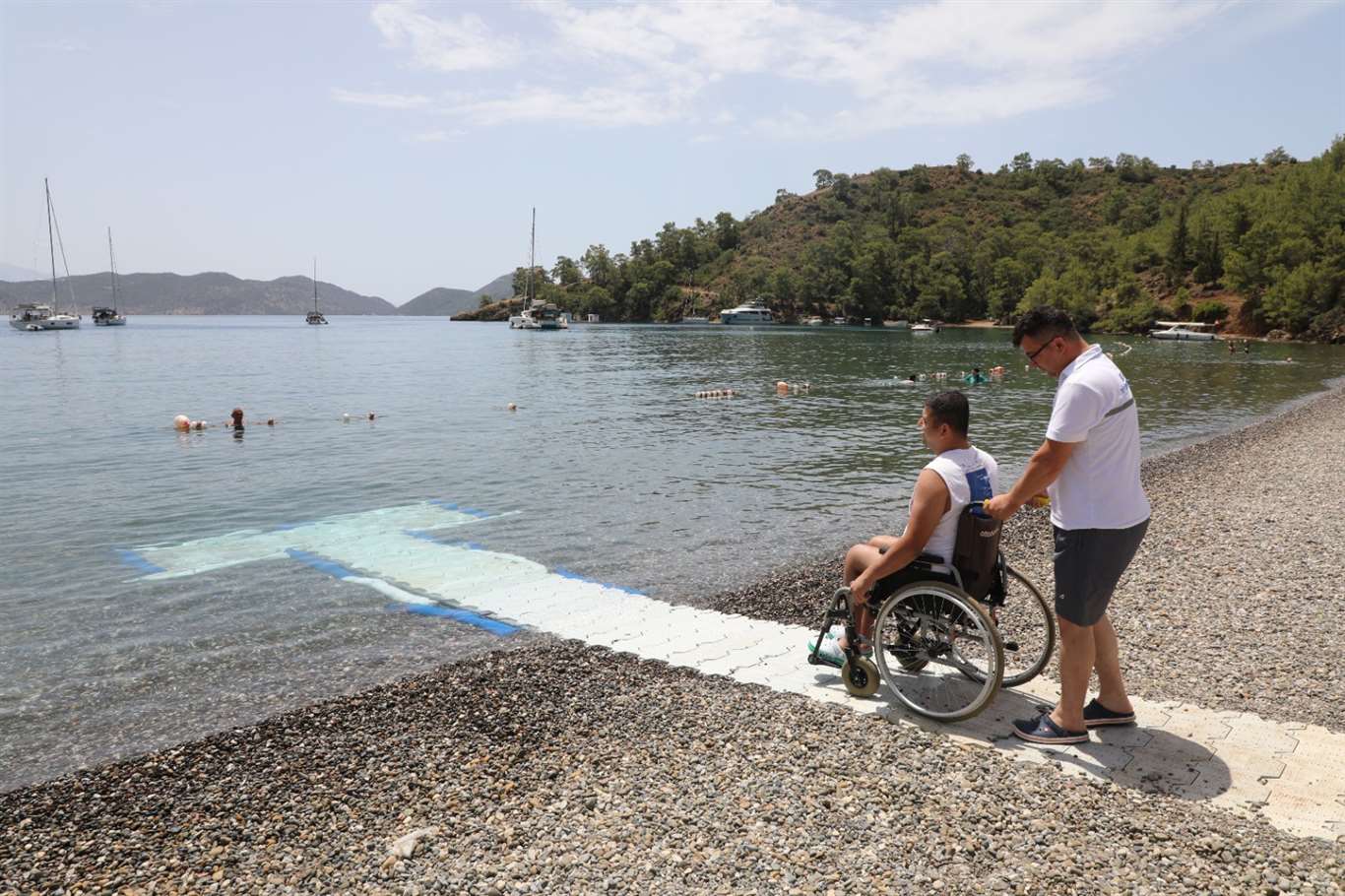    Muğla'da engelsiz plajlarla hayat kolaylaşıyor haberi